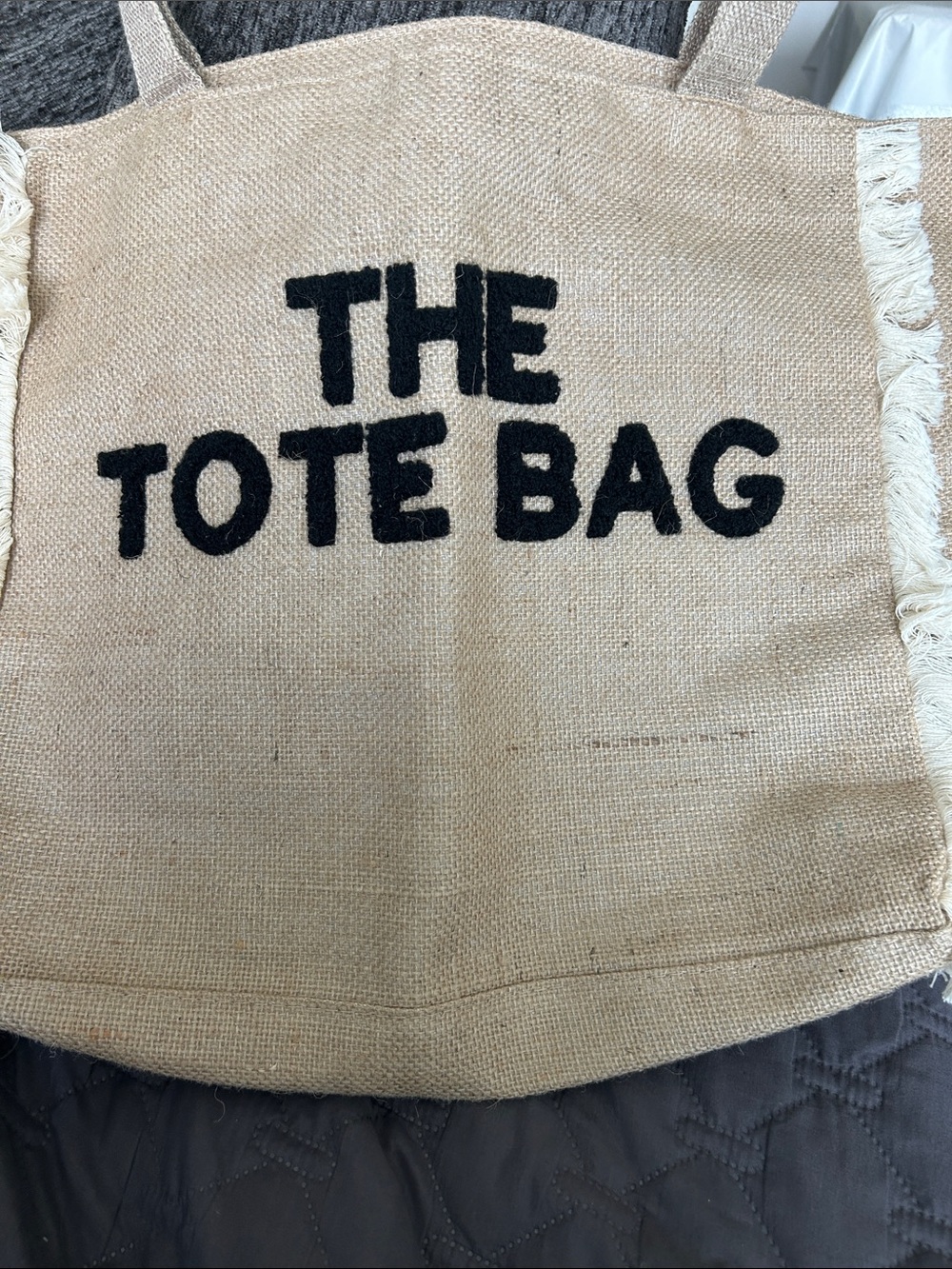 The Tote Bag Canvas Fringe Beach Tote - Black Lettering